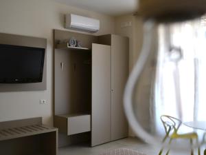 TV a/nebo společenská místnost v ubytování Soggiorni Canario