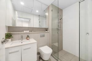 Ένα μπάνιο στο Liverpool 2 bedroom apartment with convenient transportation and surrounded by food +15 φωτογραφίες
