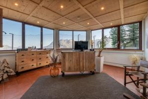 an office with a large room with windows at Berghotel Trübsee - Accessible Only by Cable Car in Engelberg
