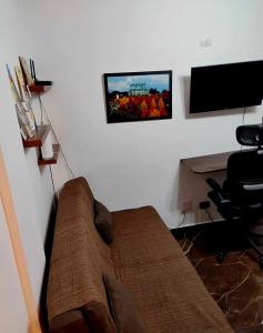 Et tv og/eller underholdning på Apê Surpreendente no Coração da Cidade