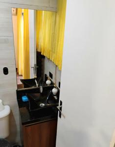 Et tv og/eller underholdning på Apê Surpreendente no Coração da Cidade