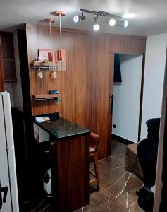 Køkken eller tekøkken på Apê Surpreendente no Coração da Cidade