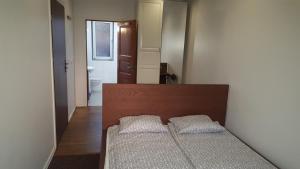 Posteľ alebo postele v izbe v ubytovaní Spa Apartamenty Lidzbark