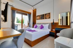 Ένα ή περισσότερα κρεβάτια σε δωμάτιο στο Stylish 3BR Villa Prinz near Nusa Dua Beach +44 φωτογραφίες