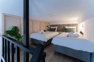 Ένα ή περισσότερα κρεβάτια σε δωμάτιο στο 4p, City center, close to University & Station +24 φωτογραφίες