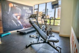 a gym with two exercise bikes in a room at Howard Johnson by Wyndham Barranquilla Versalles in Barranquilla