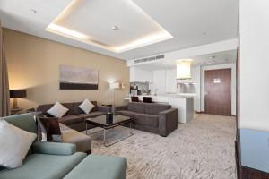 Et opholdsområde på Abi Holiday Homes - Studio & 1BR Dubai Mall Fashion Avenue Residences
