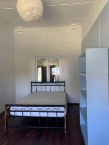 Katil atau katil-katil dalam bilik di The Beach Cottage - Close to Beach and River mouth