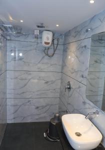 Koupelna v ubytování RK Hotel