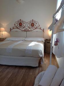 A bed or beds in a room at Il Gelsomino
