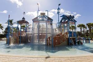 a water park with a water slide in the water at Orlando Family Friendly Home in Kissimmee