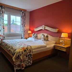 Postel nebo postele na pokoji v ubytování Hildebrandts Landhotel - bei Erfurt