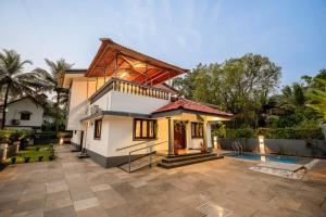 Πισίνα στο ή κοντά στο Bliss Villa 4BHK with Private Pool, Siolim, North Goa