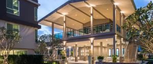 a large house with lights on the side of it at ฺBaan Peang Ploen Hua-Hin by Montri.C in Hua Hin