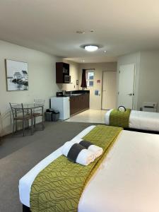 Nhà bếp/bếp nhỏ tại ASURE Avenue Motor Lodge