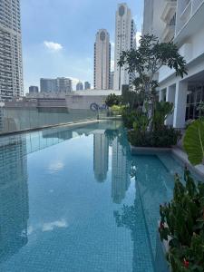 Πισίνα στο ή κοντά στο Quill Residence - Blissful Urban Condo by Azmila