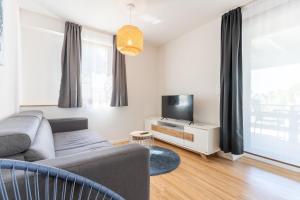 TV a/nebo společenská místnost v ubytování Ferien & Business Apartments Hohenfels + 197 fotografií