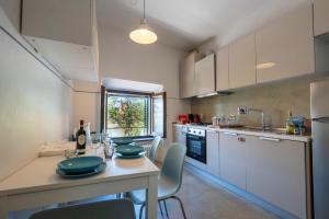 Η κουζίνα ή μικρή κουζίνα στο Vista Arno a 10 min da Pontevecchio