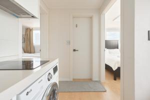 Ένα ή περισσότερα κρεβάτια σε δωμάτιο στο Panoramic View Seoul Station 2BR Newly Built