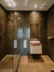 Et badeværelse på The Place to Stay