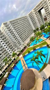 Bazén v ubytování Shell Residences near MOA and NAIA by Mae nebo v jeho okolí