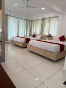 Postel nebo postele na pokoji v ubytování Honeyrock Farm Resort by Skybz + 22 fotografií