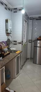Η κουζίνα ή μικρή κουζίνα στο Petit appartement à martil