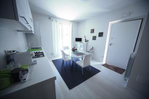 A kitchen or kitchenette at Casa Relax Suite