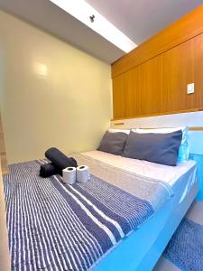 Postel nebo postele na pokoji v ubytování Shell Residences near MOA and NAIA by Mae