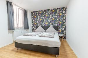 Postel nebo postele na pokoji v ubytování Ferien & Business Apartments Hohenfels