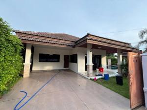 a house with a blue cord on a driveway at Unique Paradise Resort in Ban Map Fakthong