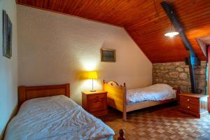 Ένα ή περισσότερα κρεβάτια σε δωμάτιο στο Ty Océane 1 - 5min du Port d'Etel