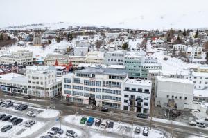 an aerial view of a city in the snow at LL Properties - Stylish Apartment in Akureyri in Akureyri