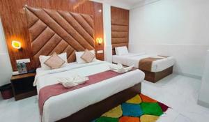 Postel nebo postele na pokoji v ubytování FabHotel Small Daddy Plus + 21 fotografií