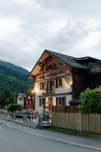 a building on the side of a road at Auberge des Gorges - Restaurant Gastronomique & Chambres in Servoz