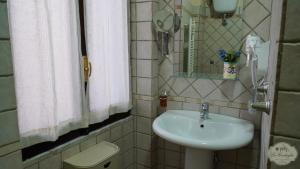 Koupelna v ubytování Le Cortiglie Affittacamere + 29 fotografií