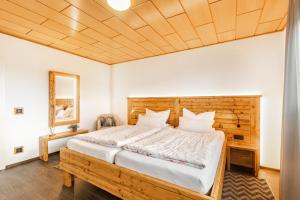 Ένα ή περισσότερα κρεβάτια σε δωμάτιο στο Chalet Am Scheidt