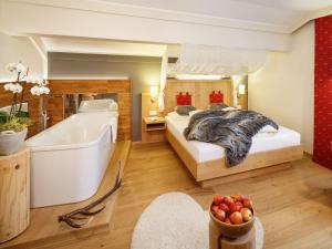Posteľ alebo postele v izbe v ubytovaní Hotel Lärchenhof