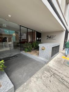 a large building with a lobby with glassdoors at Spectacular apartment in the heart of Bogotá! in Bogotá +5 photos