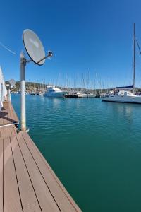 a view of a marina with boats in the water at Luxury Floating Sea House Star Line - Marina Portorož in Portorož