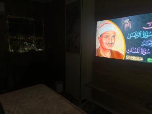 Μια τηλεόραση ή/και κέντρο ψυχαγωγίας στο Super Elite apartment - Aswan city center apartments +47 φωτογραφίες