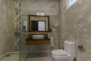 Koupelna v ubytování Kiwengwa Beach Resort