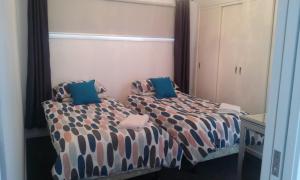 Postel nebo postele na pokoji v ubytování Jindabyne Guest House