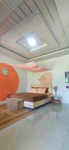 Televiisor ja/või meelelahutuskeskus majutusasutuses Sarah's Cottage Toba Samosir