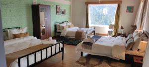 Postel nebo postele na pokoji v ubytování Katie's Abode, Hartola