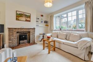 a living room with a couch and a fireplace at 3 Bed in Winchelsea oc-t33107 in Winchelsea