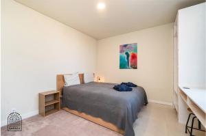 Giường trong phòng chung tại Good Times Sagres