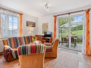 Posezení v ubytování Holiday Home Zásada by Interhome