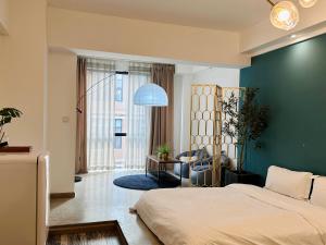 Ένα ή περισσότερα κρεβάτια σε δωμάτιο στο Hongyadong Jiefangbei