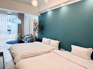 Ένα ή περισσότερα κρεβάτια σε δωμάτιο στο Hongyadong Jiefangbei +3 φωτογραφίες